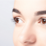 Woman with beautiful eyebrows close-up